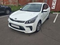 Прокат автомобиля kia rio 2017 года белого цвета