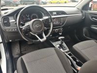 Фото салона kia rio 2017 года белого цвета