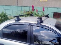 Универсальный багажник на крышу D-Lux 1 на Chevrolet Lanos, стальные прямоугольные дуги