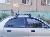 Универсальный багажник на крышу Chevrolet Lanos - D-Lux 1, крыловидные дуги