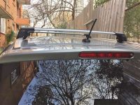 Багажник на крышу Suzuki SX4 II 2013-, Turtle Air 2, аэродинамические дуги на интегрированные рейлинги (серебристый цвет)