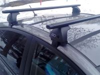 Багажник на крышу Kia Sportage 2016-... (без рейлингов), Евродеталь, аэродинамические дуги (черный цвет)