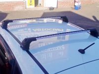 Багажник на крышу Mazda CX-7, Turtle Air 3, аэродинамические дуги в штатные места (серебристый цвет)