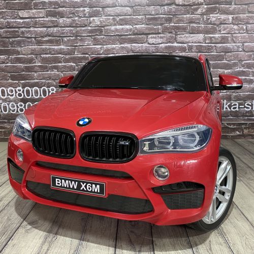 Детский электромобиль BMW X6M (JJ2168) красный двухместный