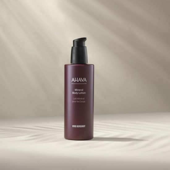 Лосьон для тела Минеральный Ahava Vivid Burgundy, 250 мл - тюбик на сером фоне
