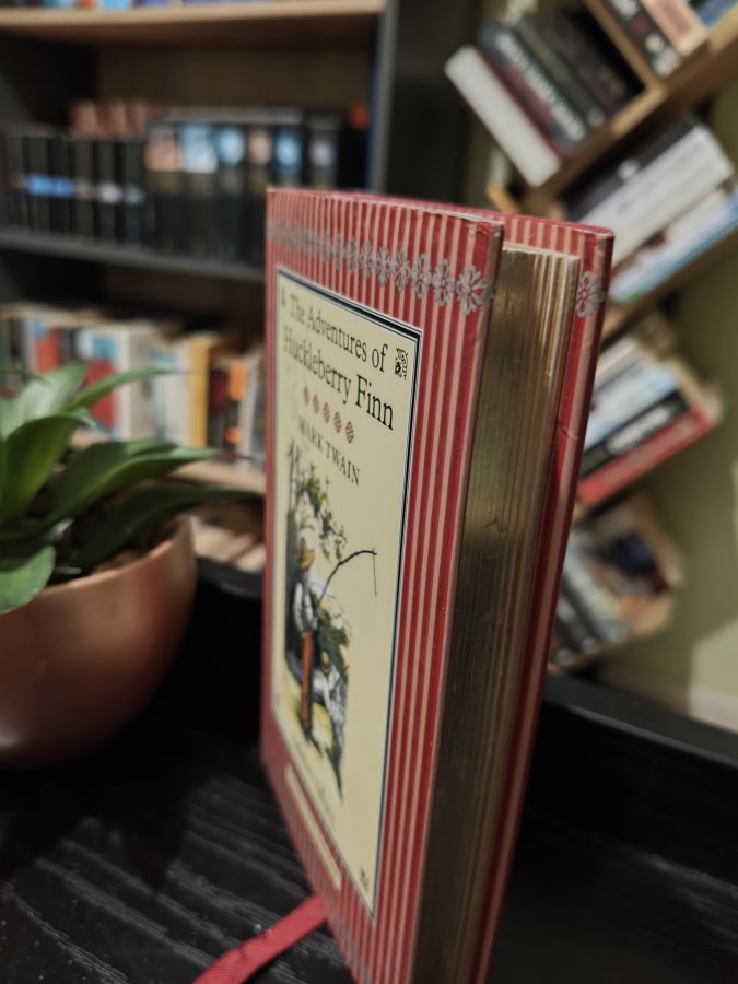 The adventures of Huckleberry Finn by Mark Twain