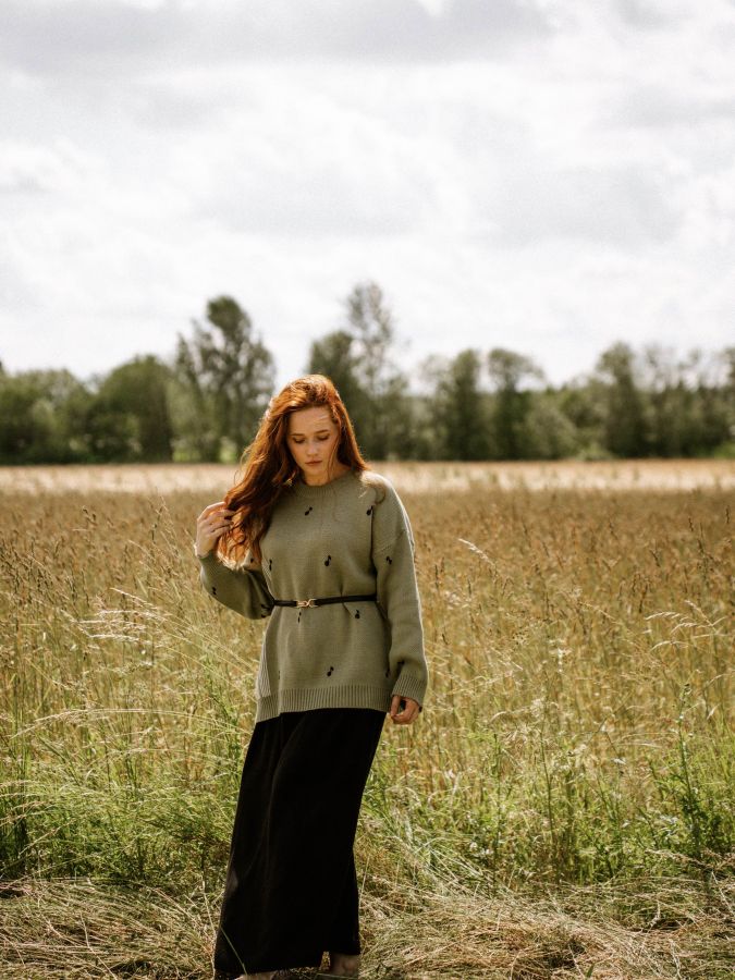 Свитер зеленый с нотами