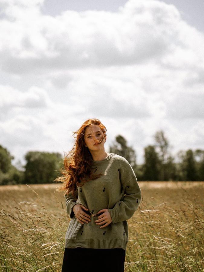 Свитер зеленый с нотами