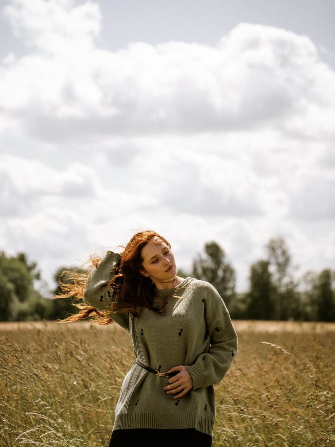 Свитер зеленый с нотами