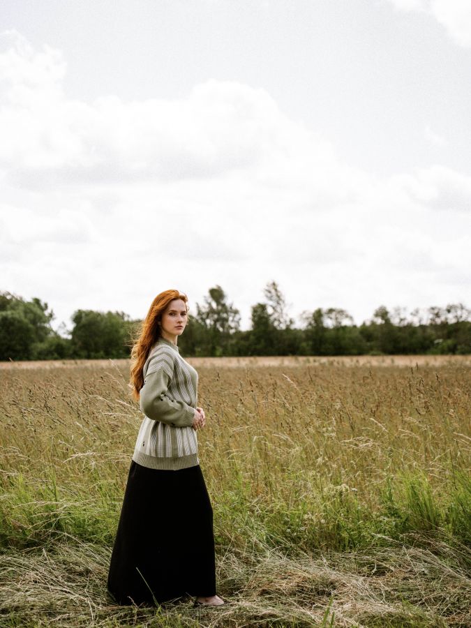 Свитер зеленый с нотами