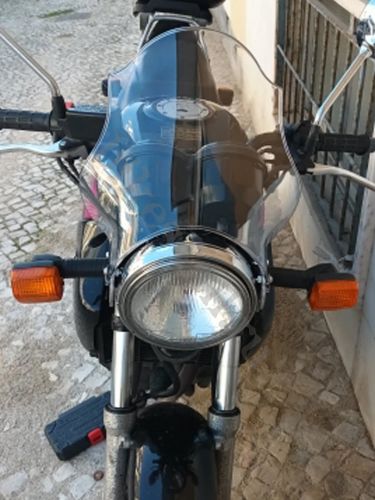 Ветровик для круглой фары мотоцикла прозрачный