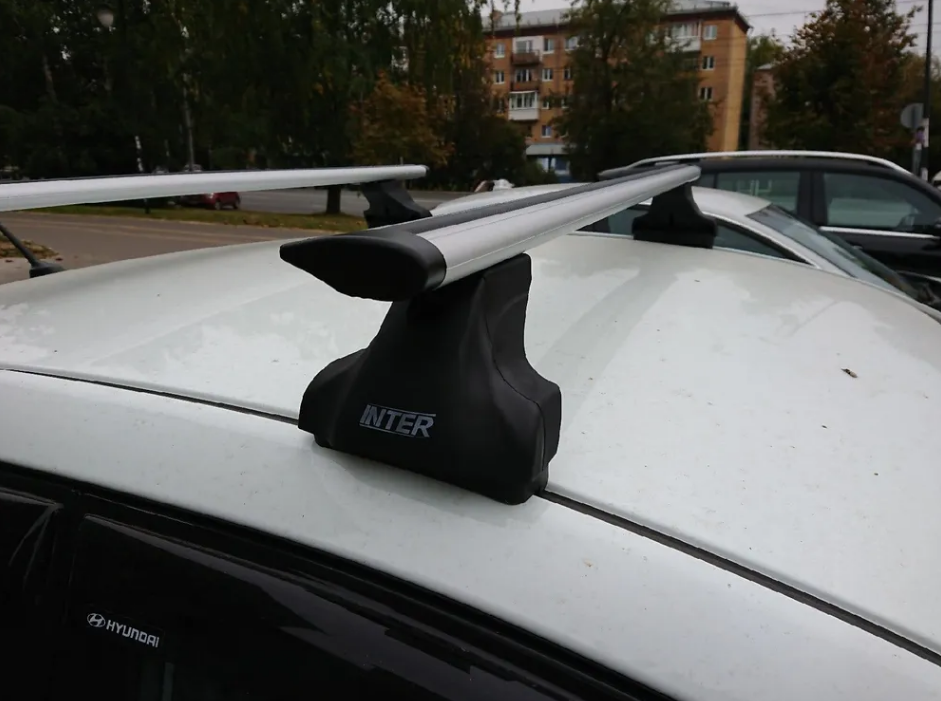 Багажник на крышу INTER Spectr в штатные места с аэродинамическими дугами КРЫЛО (82 мм)