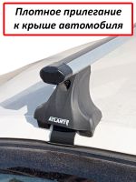 Багажник на крышу Skoda Octavia A7, Атлант, аэродинамические дуги Эконом, опора Е