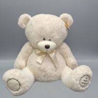 Большой медведь с бантиком