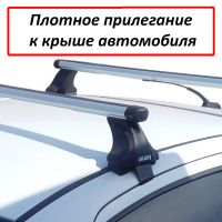 Багажник на крышу Lada Vesta sedan, Атлант, аэродинамические дуги Эконом, опора Е